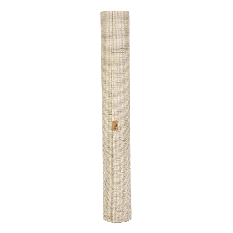 Tall rolled-up woven yoga mat on a white background