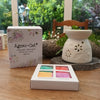 Emmy Jane - Ceramic Diffuser Gift Set with Soy Wax Melts from Agnes+Cat. Each oil burner has a pretty floral design, with leaves and flowers which allow the candlelight to shine through creating that relaxing atmosphere. Each diffuser comes with 4 soy wax melts: Seasalt & Moss, Tea and Roses, Rhubarb and Parma Violet.