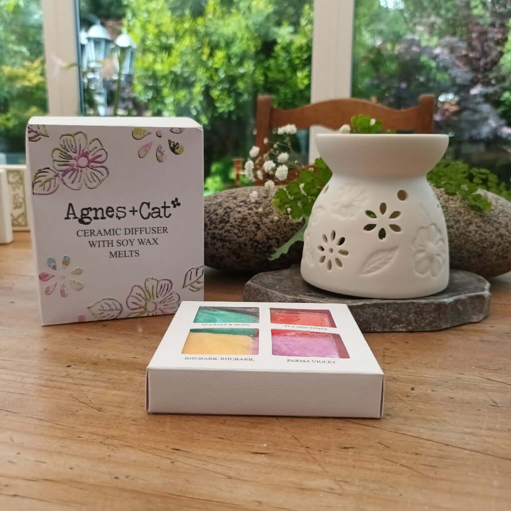 Emmy Jane - Ceramic Diffuser Gift Set with Soy Wax Melts from Agnes+Cat. Each oil burner has a pretty floral design, with leaves and flowers which allow the candlelight to shine through creating that relaxing atmosphere. Each diffuser comes with 4 soy wax melts: Seasalt & Moss, Tea and Roses, Rhubarb and Parma Violet.