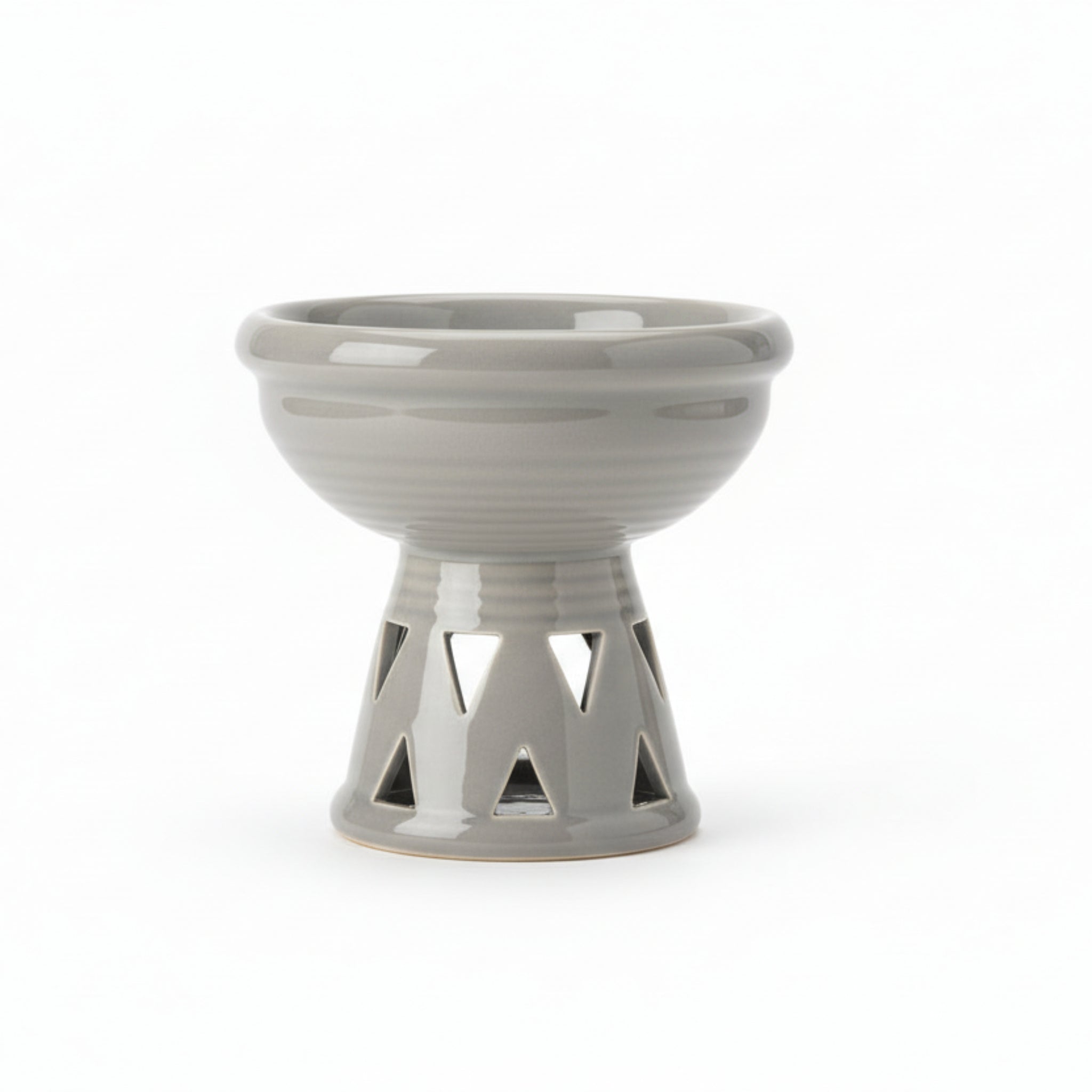 grey ceramic bowl with a unique base design on a white background
