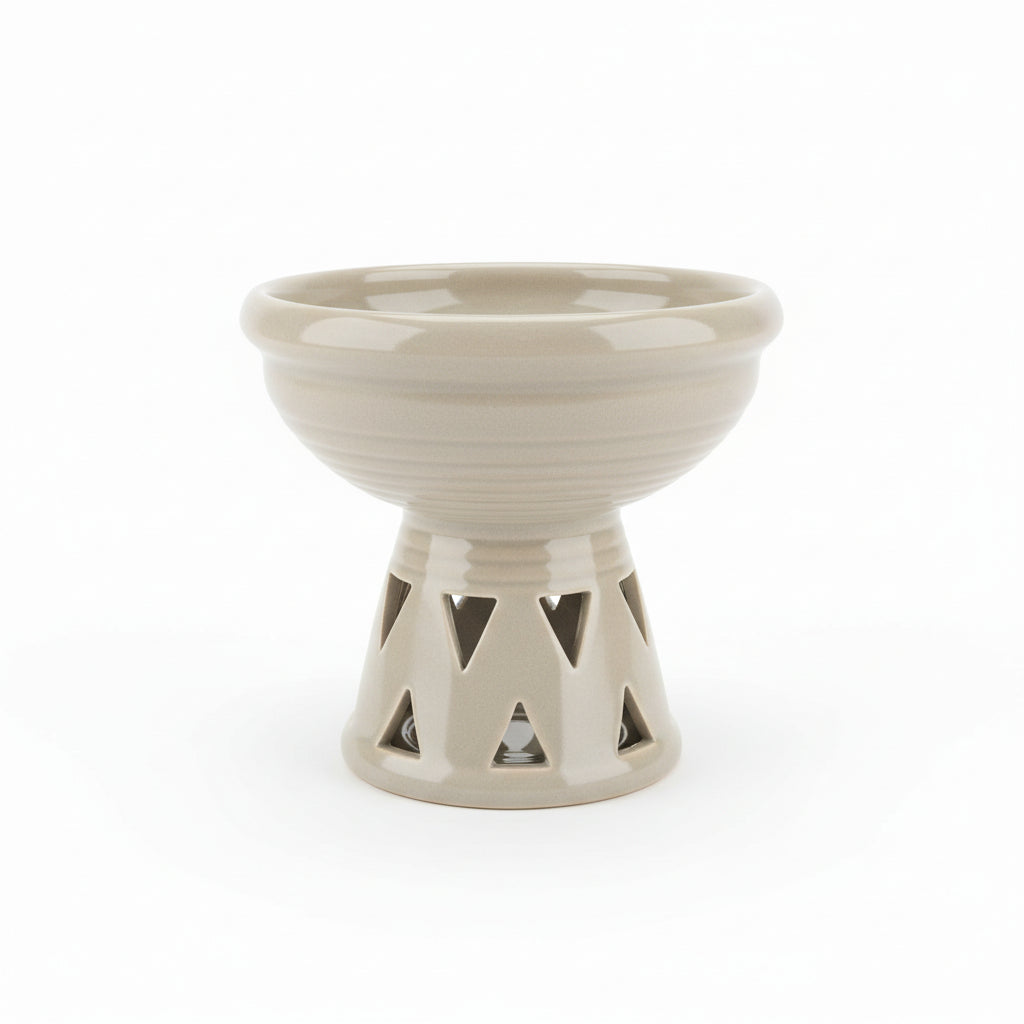 Ceramicoil burner with geometric base on a white background