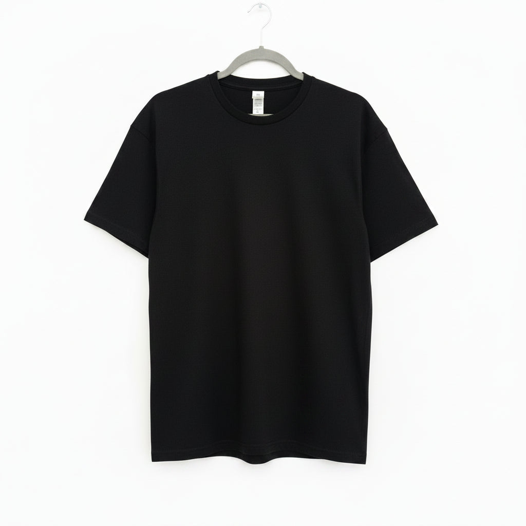 Mens Black cotton t-shirt on a hanger against a white background