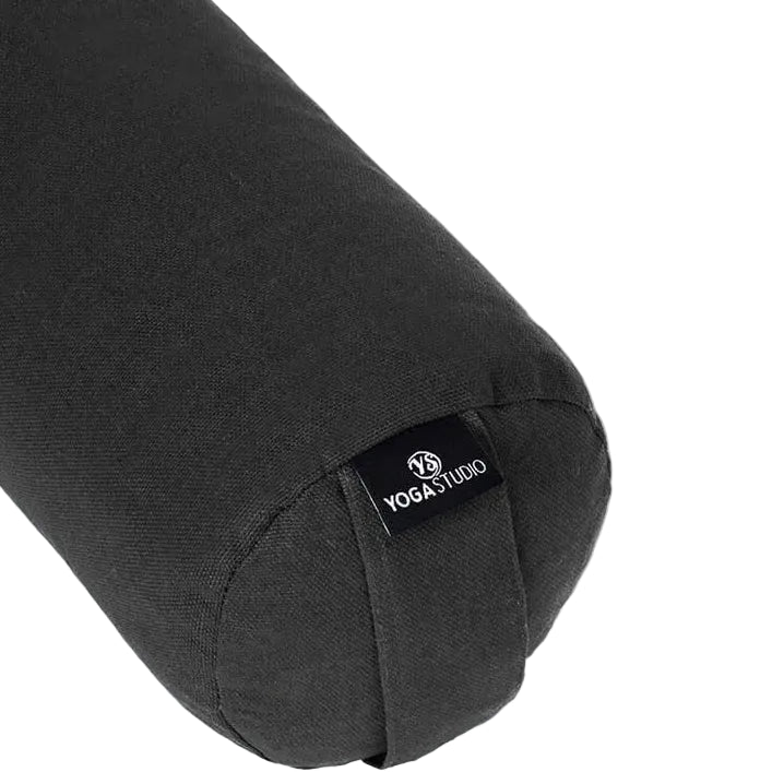 Black yoga bolster with 'Yoga Studio' logo on a white background