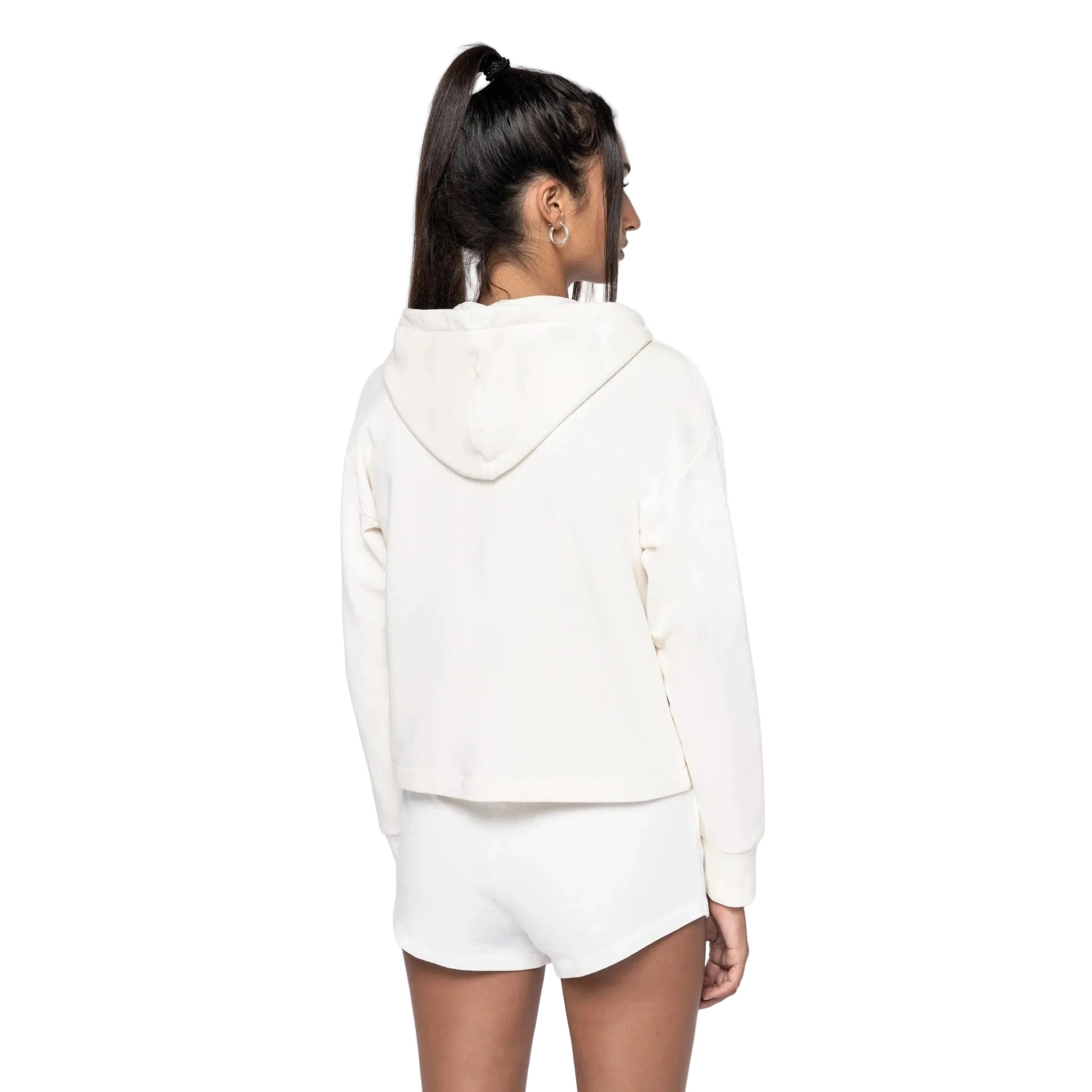 Person wearing a white hoodie and shorts on a white background