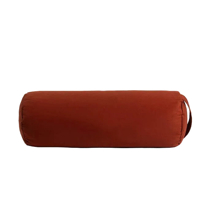 Brown cylindrical pillow on a white background