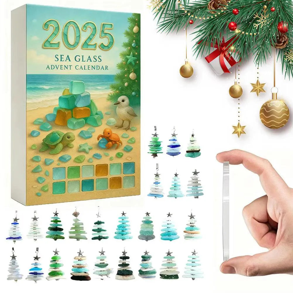 2025 Sea Glass Advent Calendar with decorative items and a hand holding a sea glass piece.
