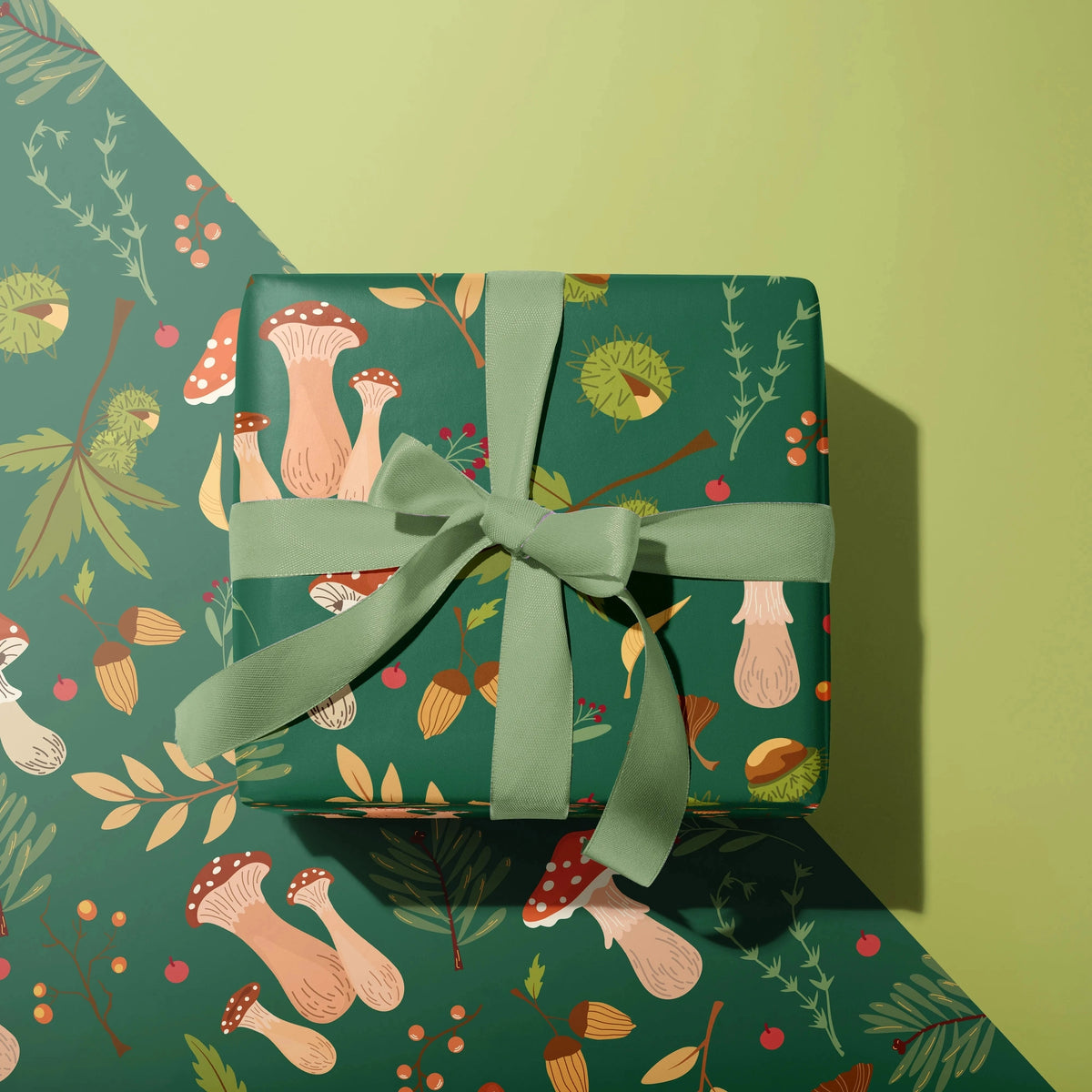 Gift-wrapped present with mushroom pattern and green ribbon on a matching background