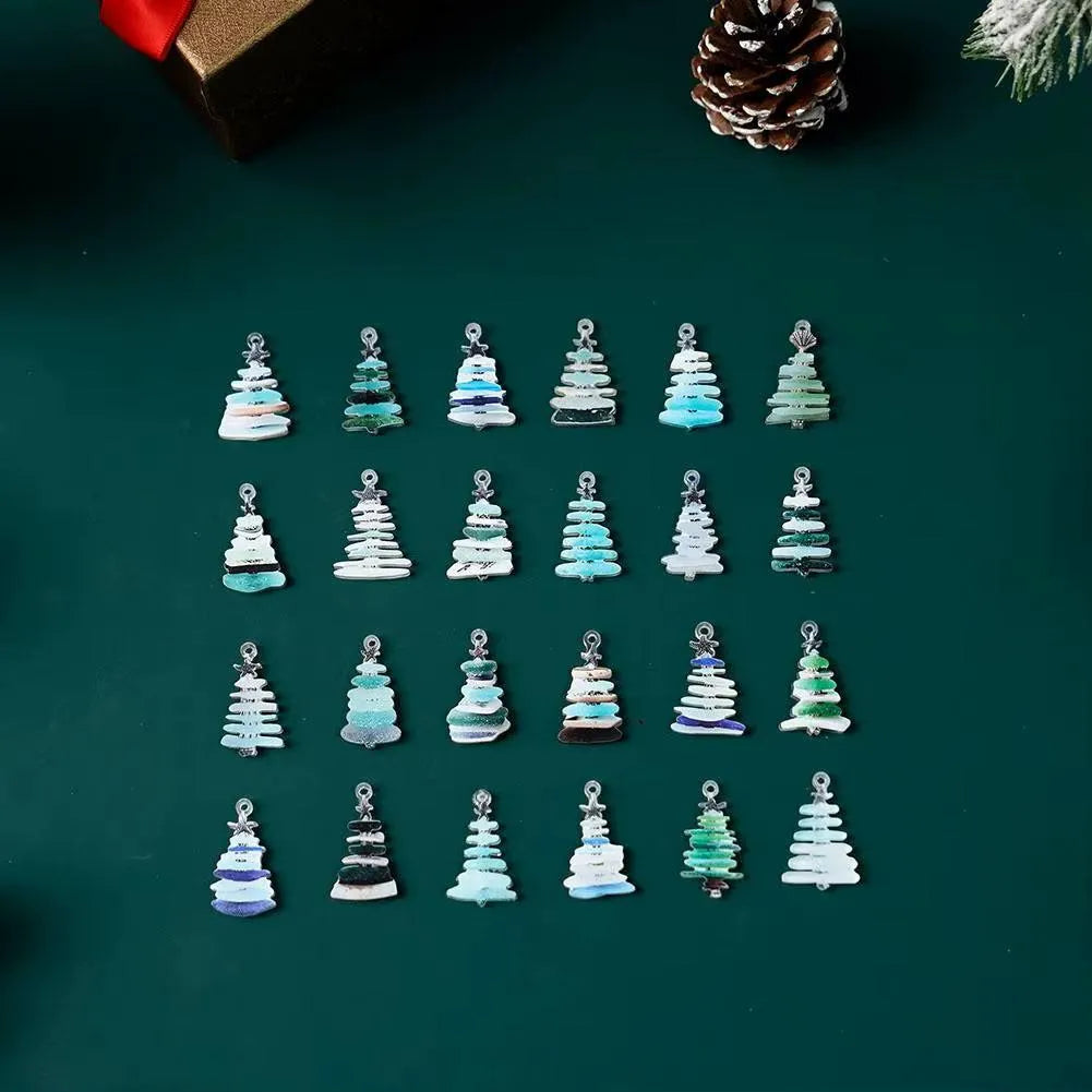 Set of Christmas tree-shaped ornaments on a green background