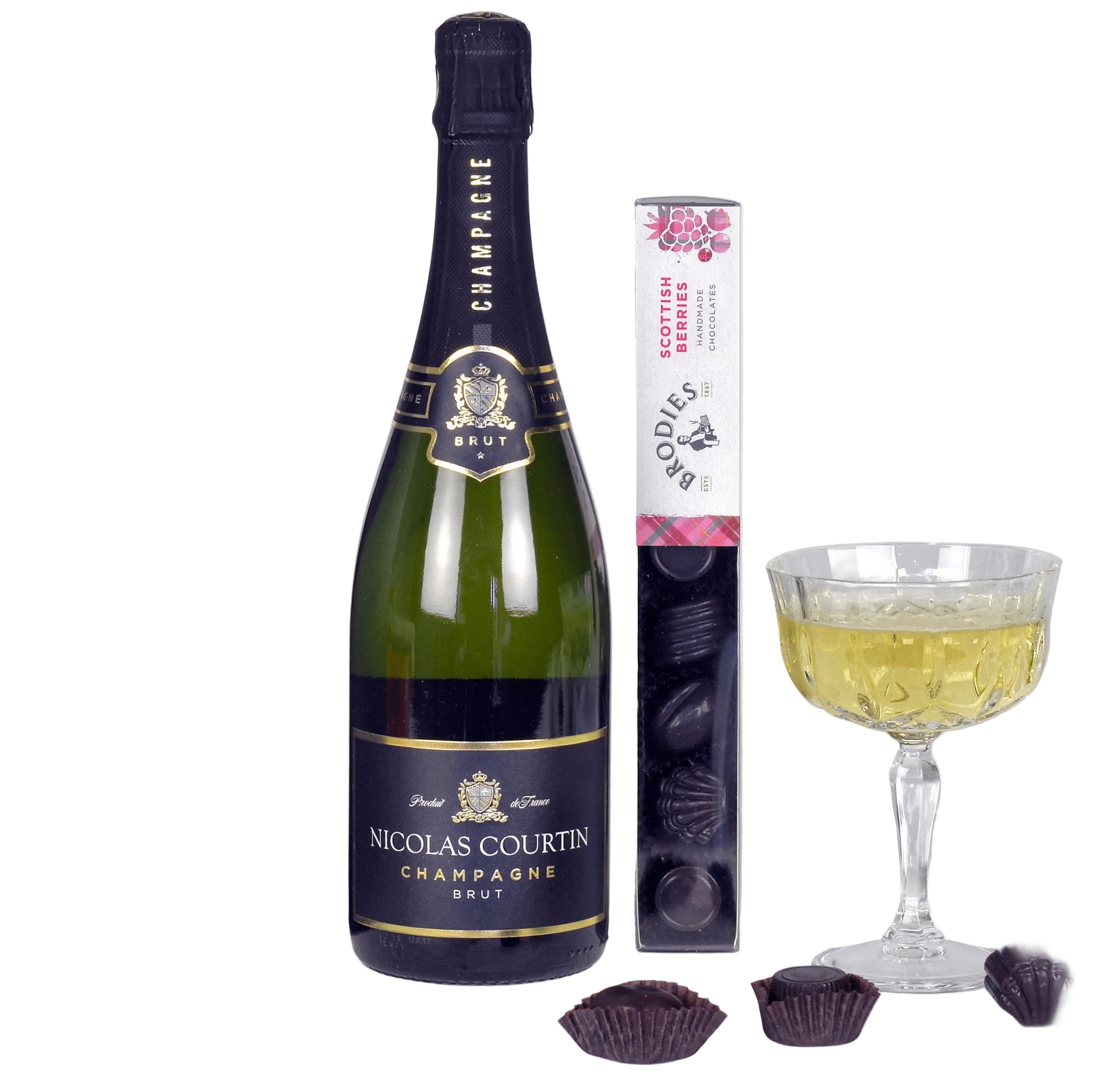 Bottle of Nicolas Courtin champagne with a box of chocolates and a glass of champagne on a white background