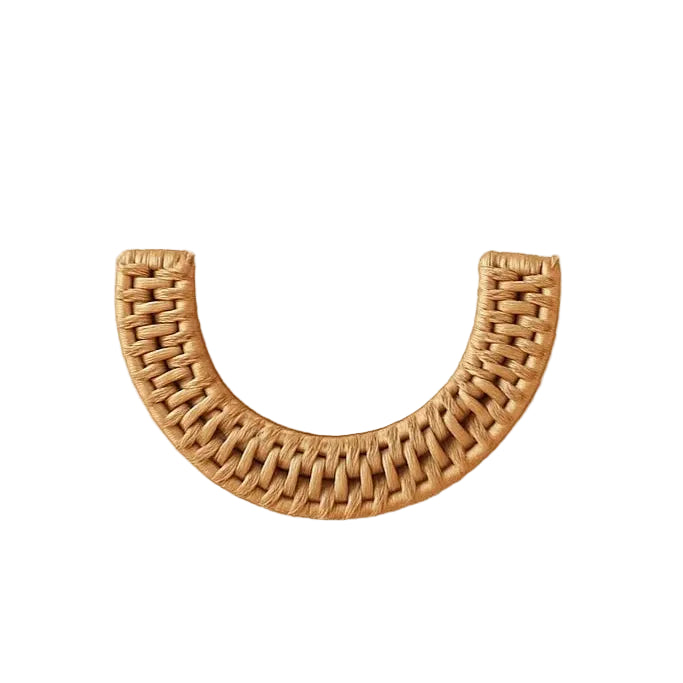 Dunstanburgh half moon rattan handle showing its woven texture on a white background