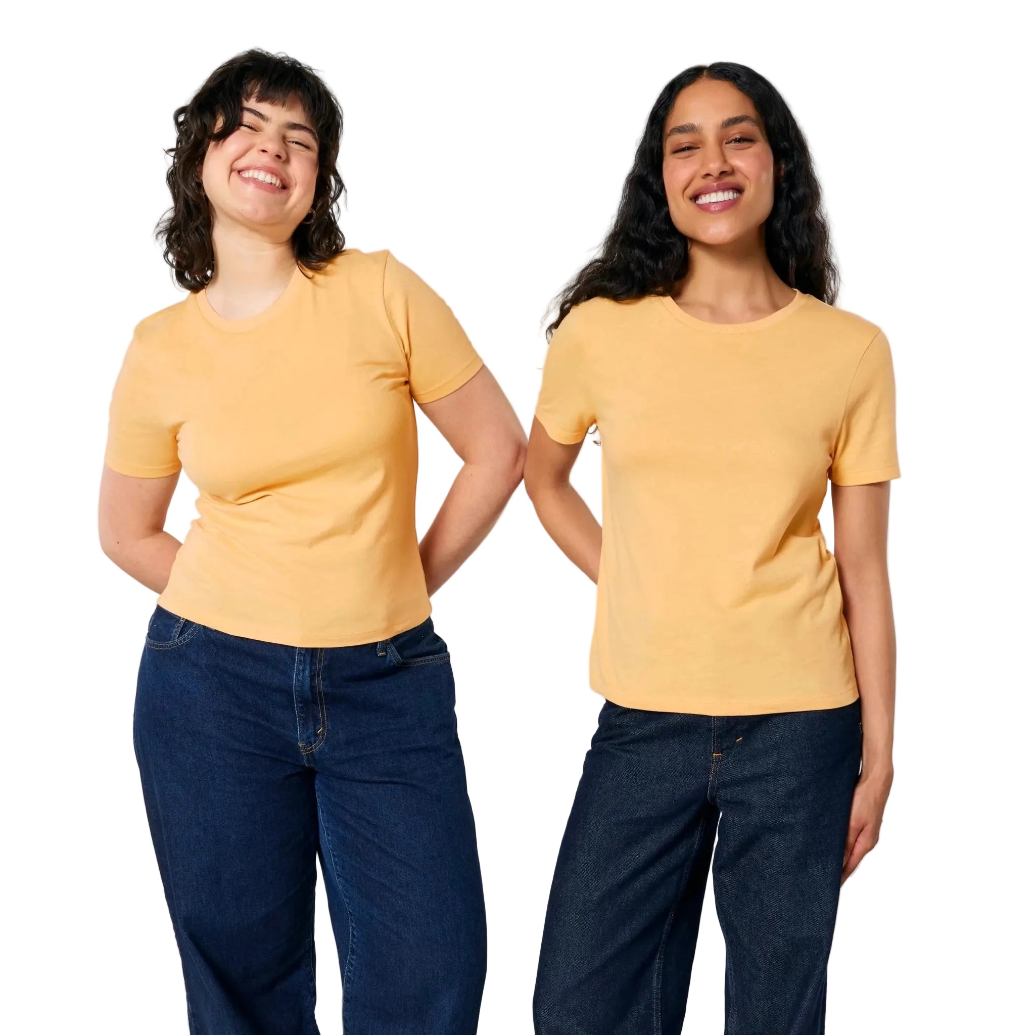 Two women wearing yellow t-shirts and blue jeans on a white background