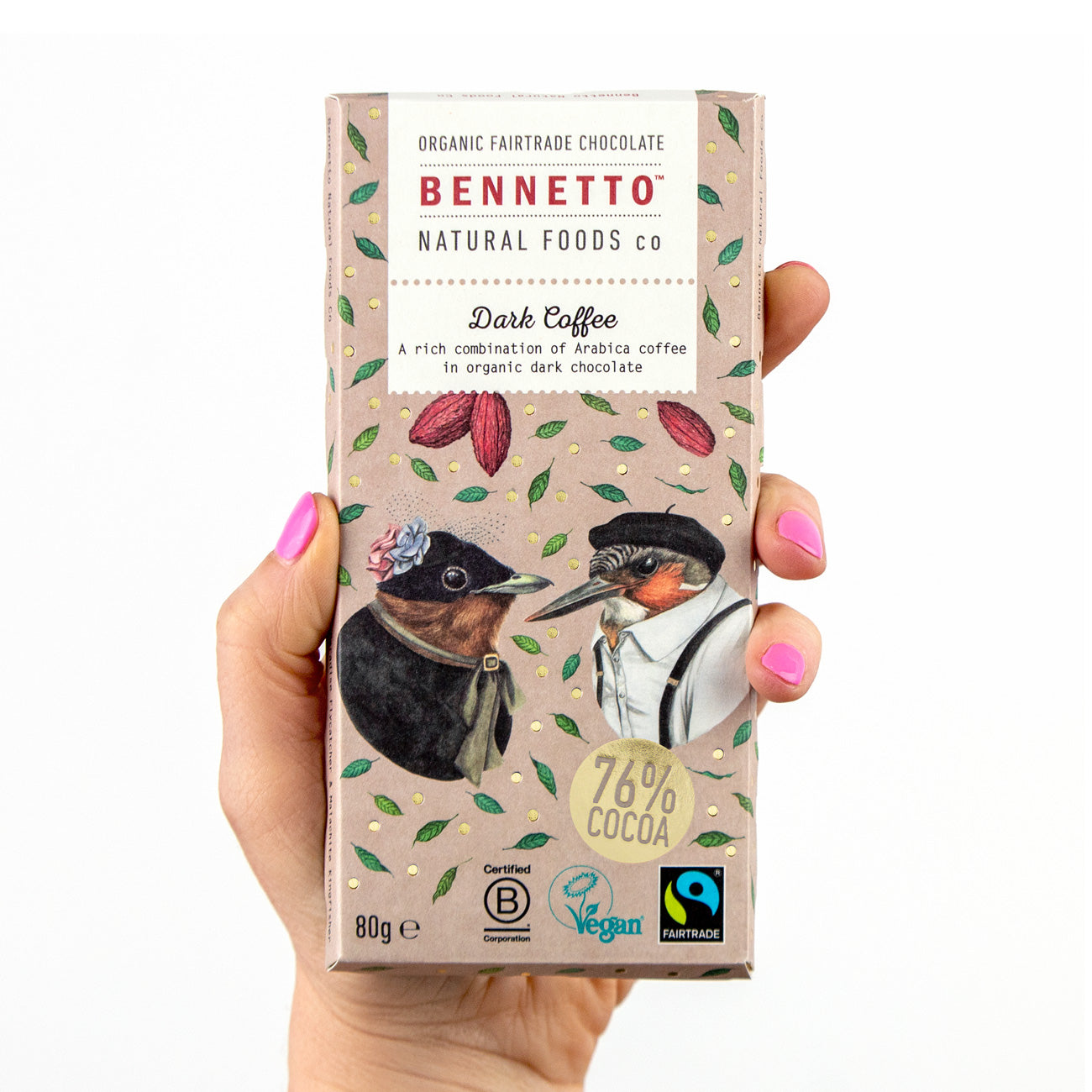 Hand holding a Bennetto dark coffee chocolate bar packaging