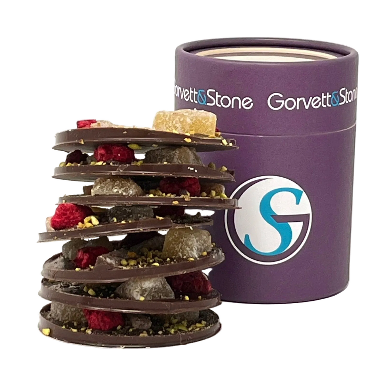 Chocolate tower with various ingredients next to a purple Gorvet&Stone container on a white background