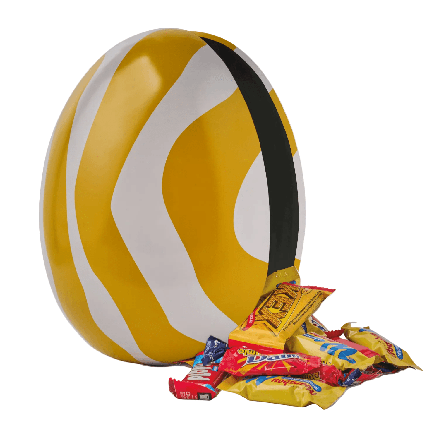 Yellow and white striped Nordic Easter egg with chocolates  on a white background
