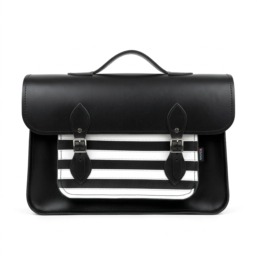 Front view of Zatchels 16-inch Gothic leather satchel with black flap and black-and-white striped front pocket