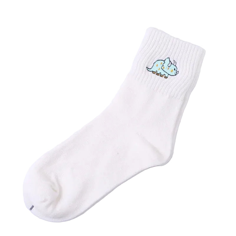 White Stegosaurus embroidered dinosaur cotton tube socks folded on white background - Emmy Jane Boutique