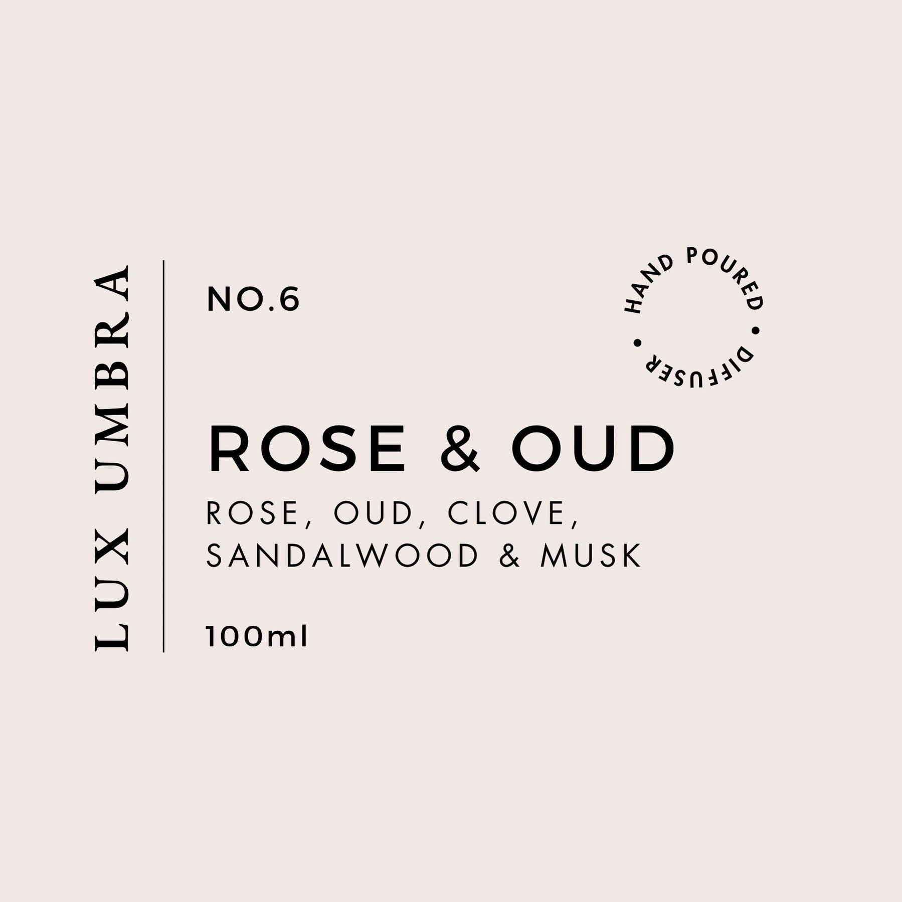 Lux Umbra Rose & Oud diffuser label on a light pink background