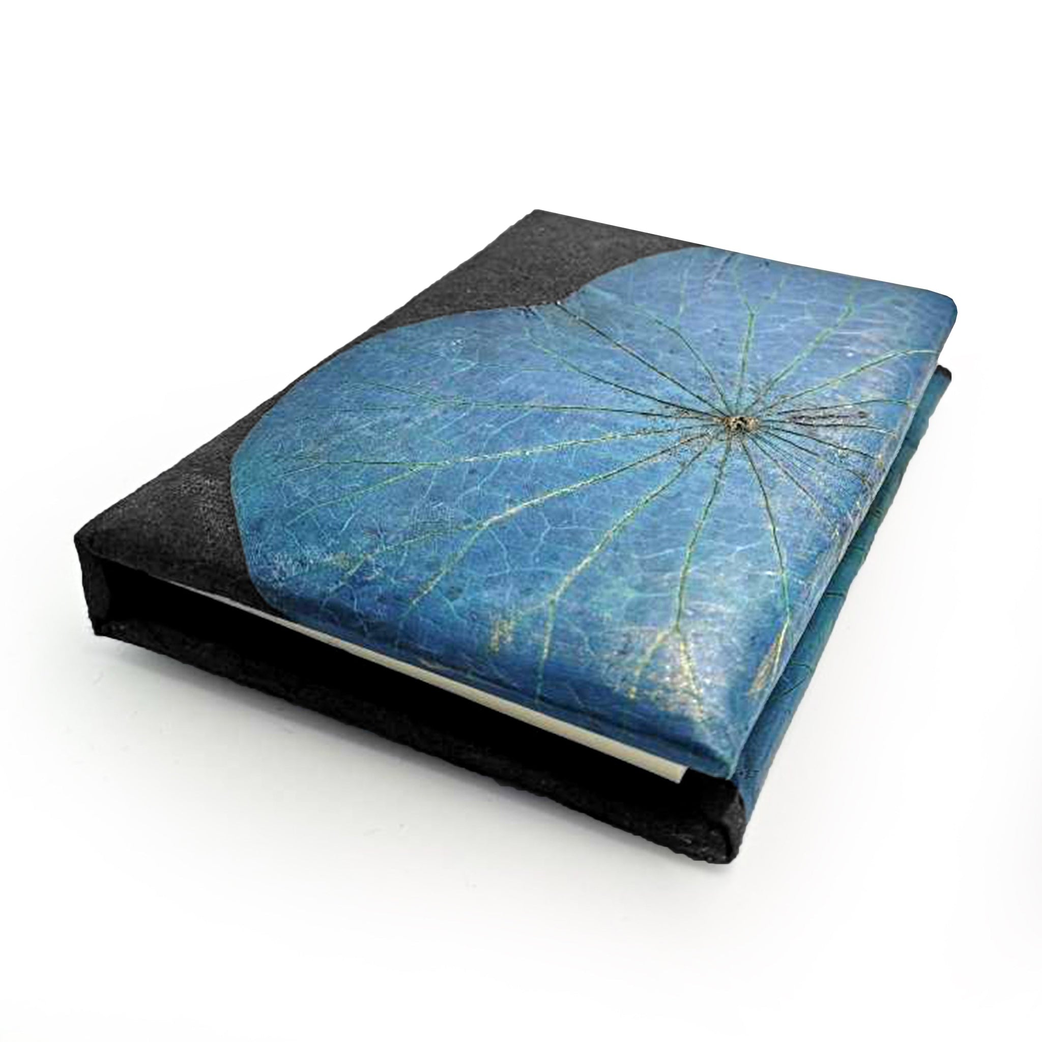 Notebook with blue floral design on a white background