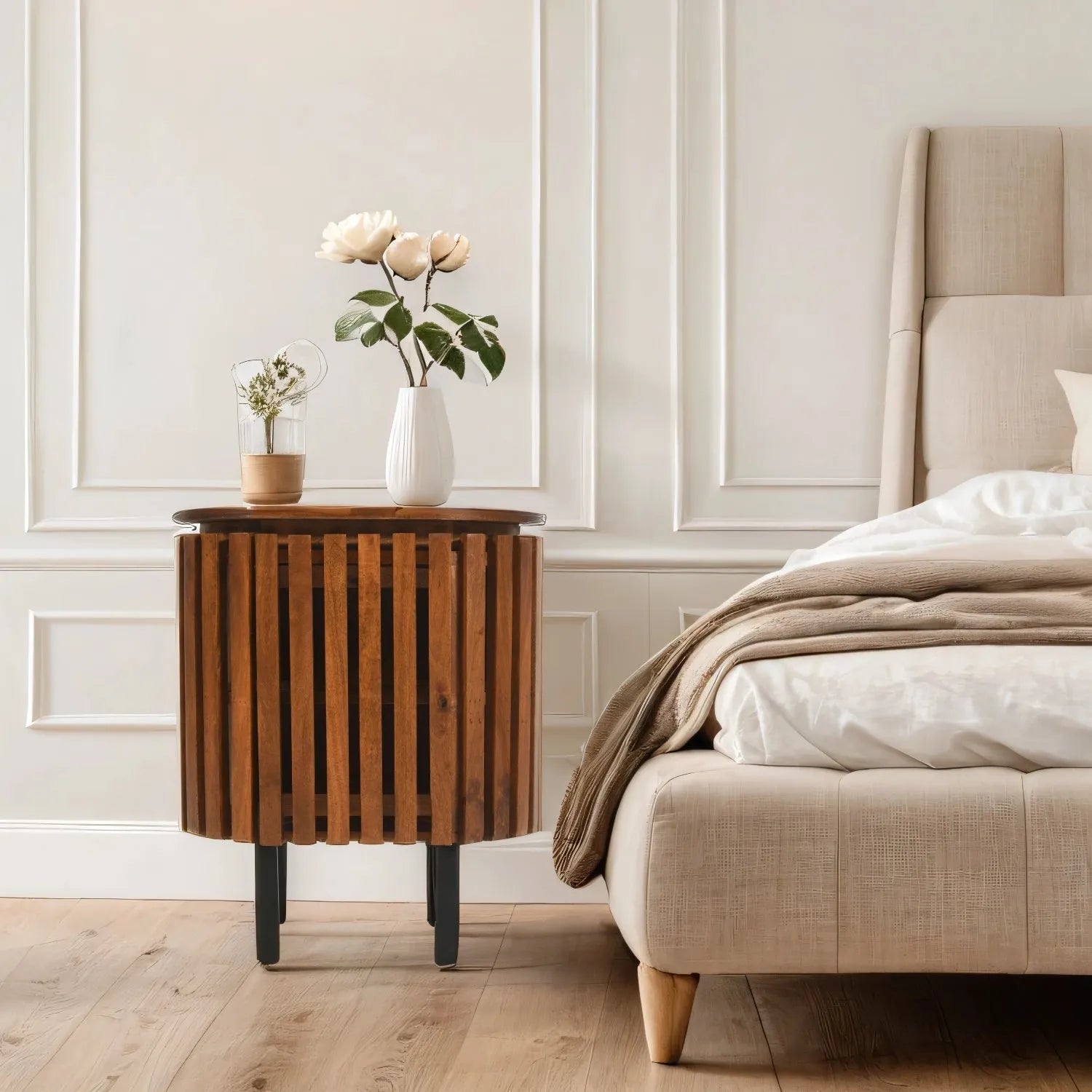 Verty Furniture Compton Mango Wood Bedside Table  on a wooden floor next to a stylish bed