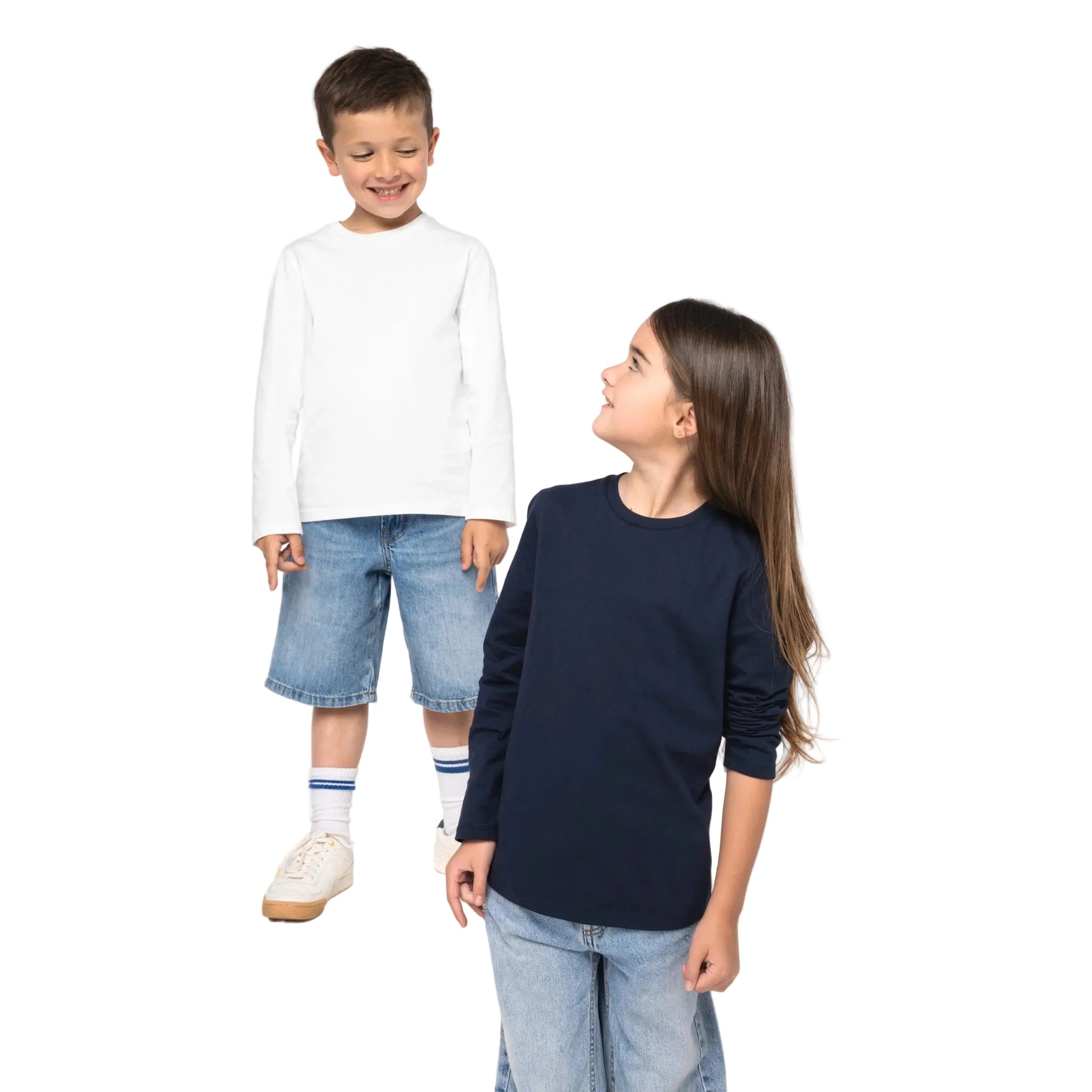 Two children wearing organic cotton T-shirts, a boy and a girl, standing side by side on a white background.