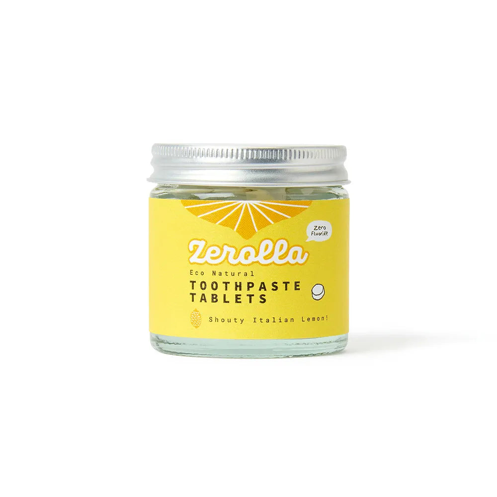 Jar of Zerolla toothpaste tablets with a yellow label on a white background