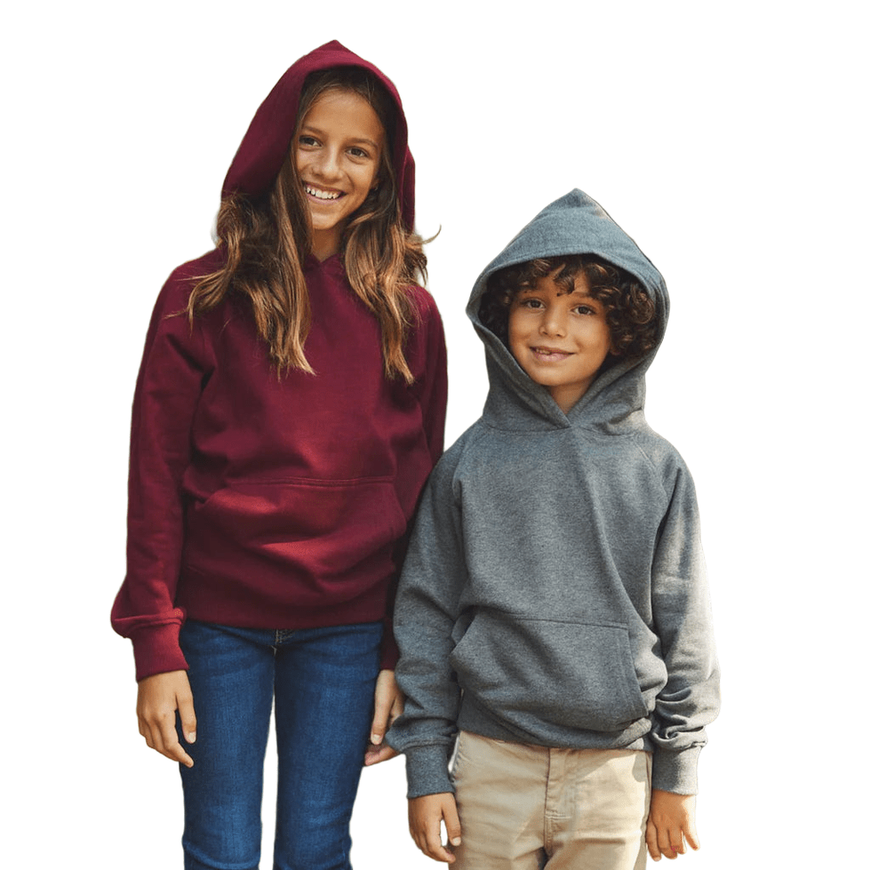 Two children wearing hoodies on a white background