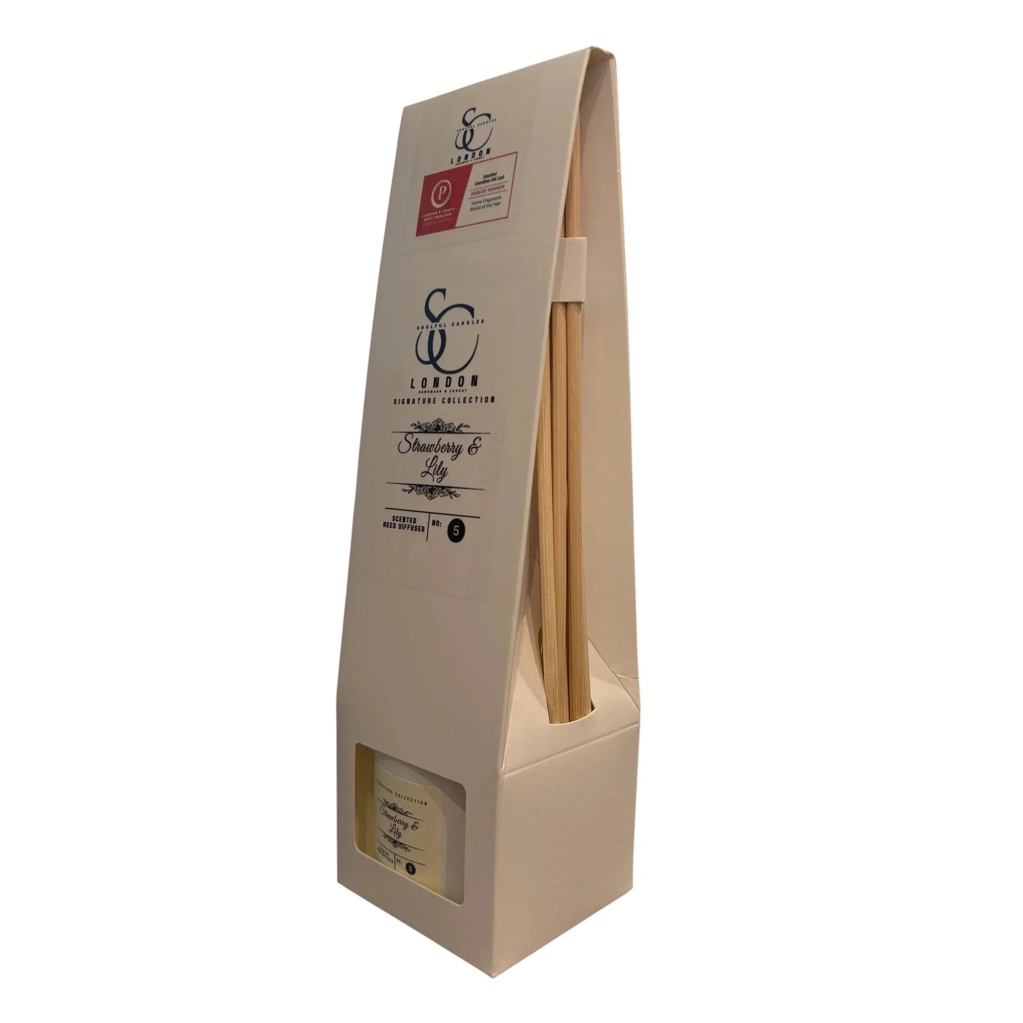 Packaged natural reed diffuser with a white background