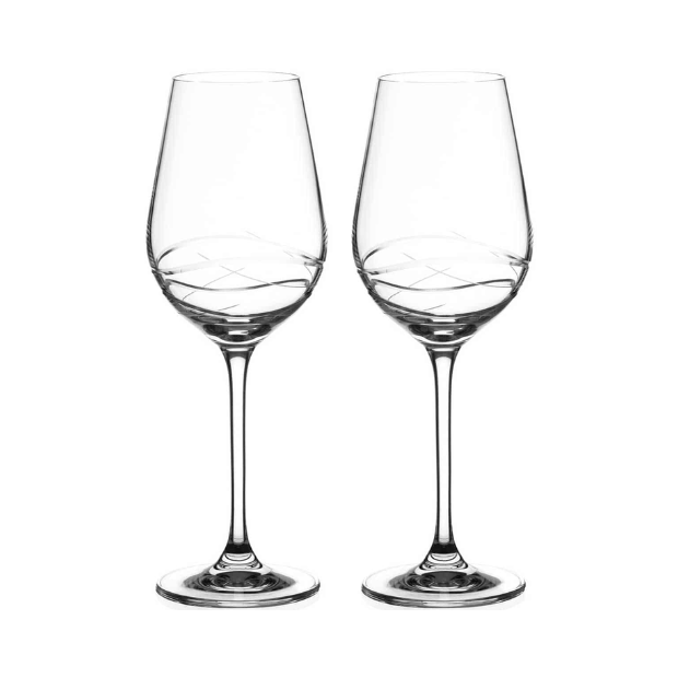 Two clear wine glasses on a white background