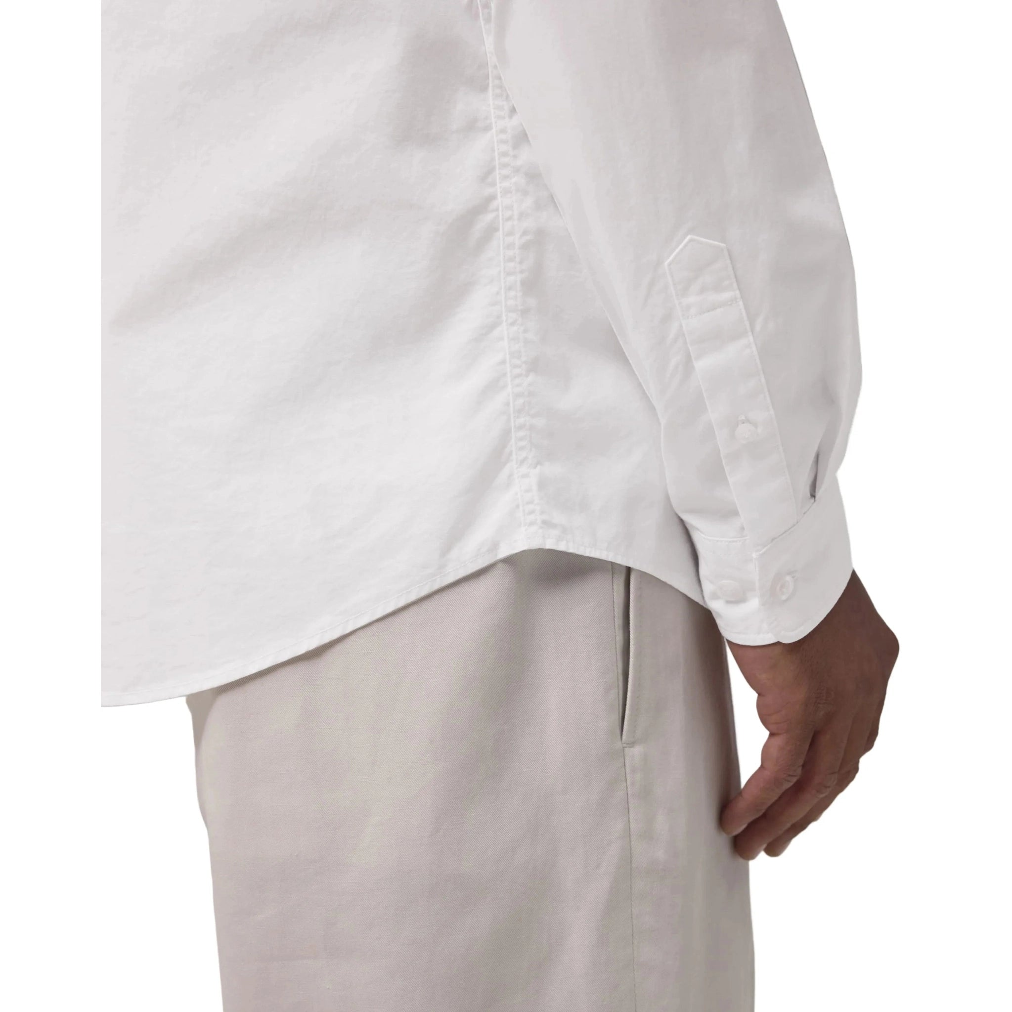 White shirt and beige pants on a white background