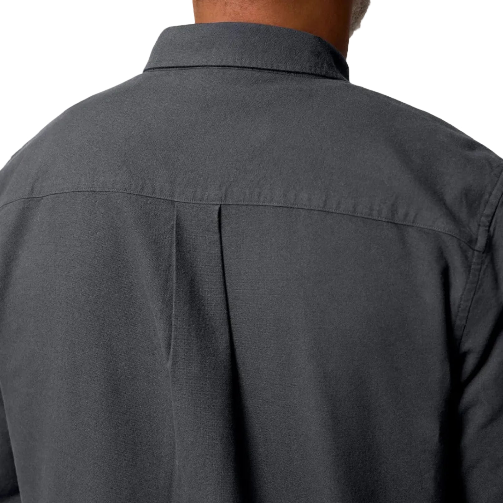 Dark grey shirt worn by a person on a white background