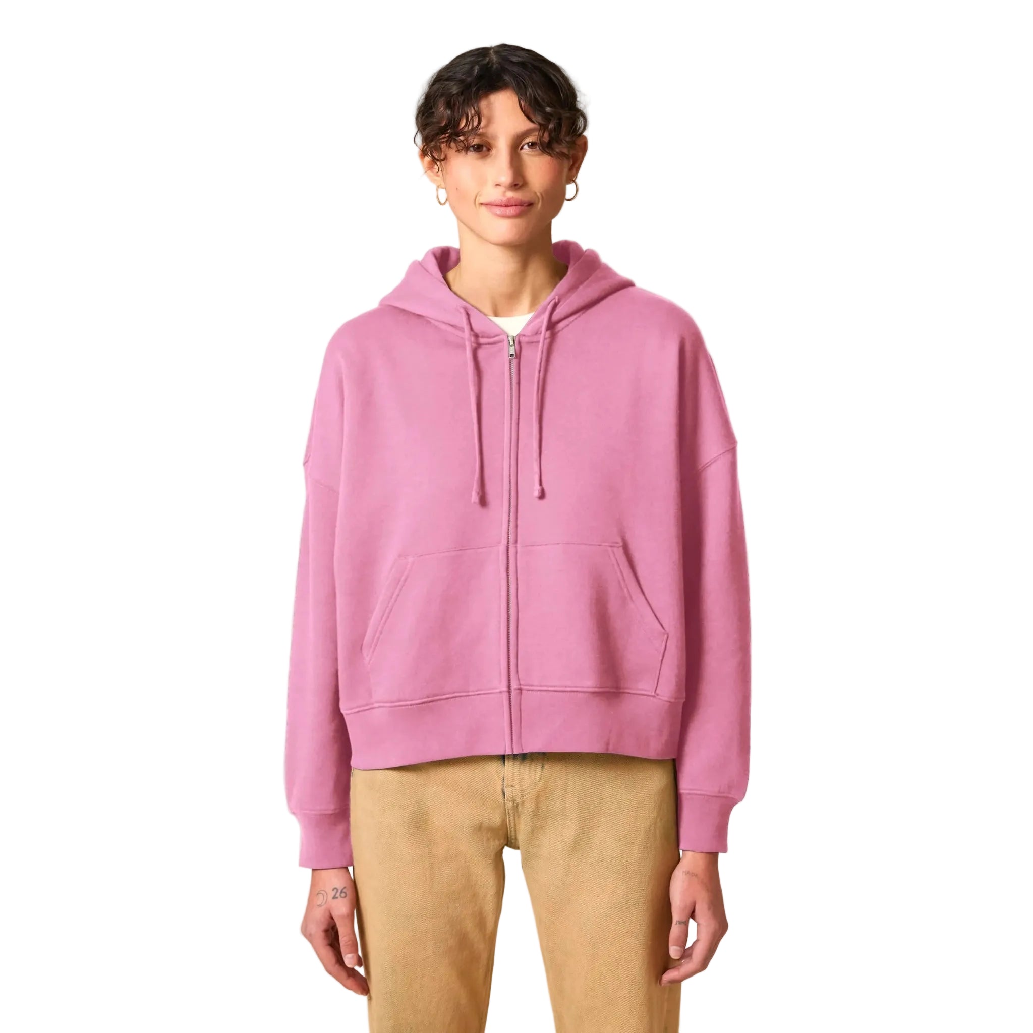 Person wearing a pink hoodie on a white background