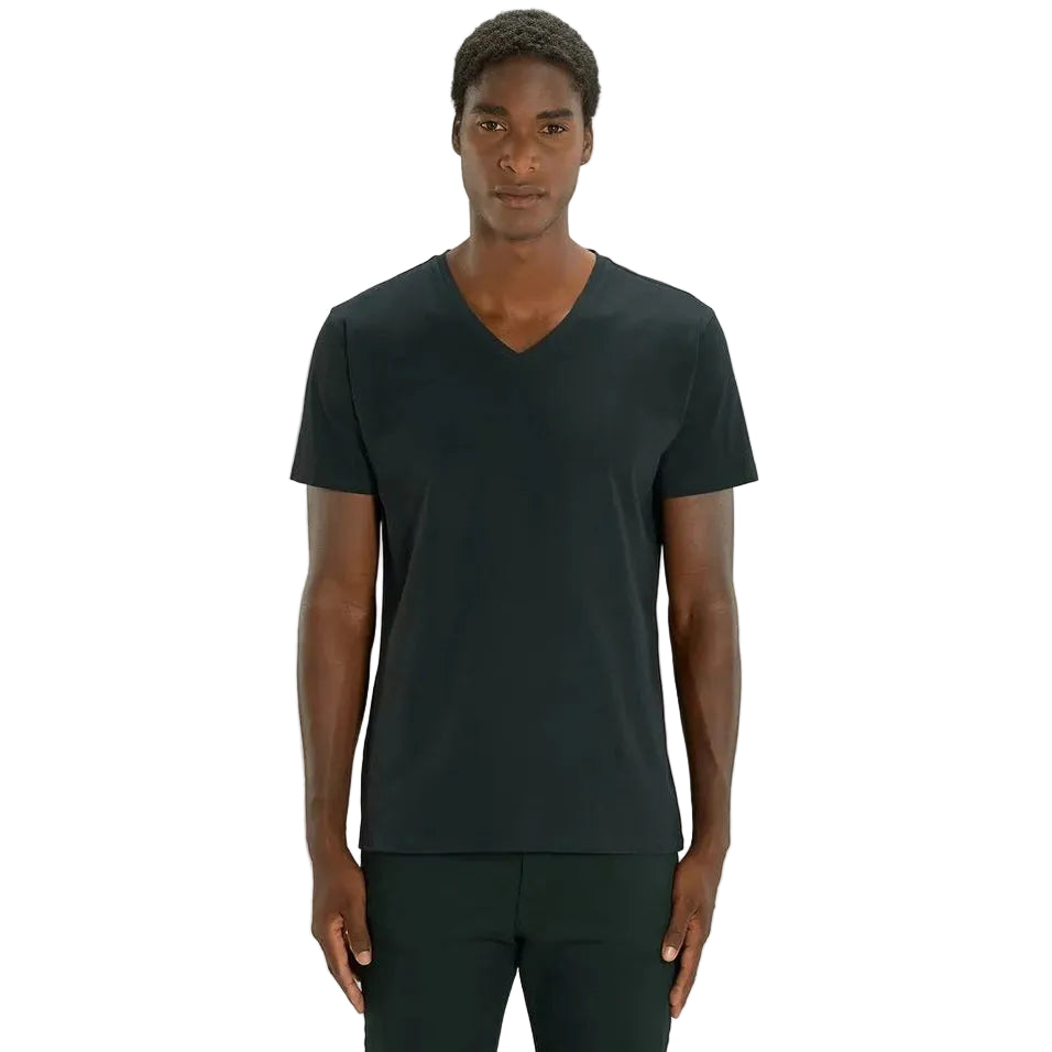 Man wearing a dark green t-shirt and pants on a white background