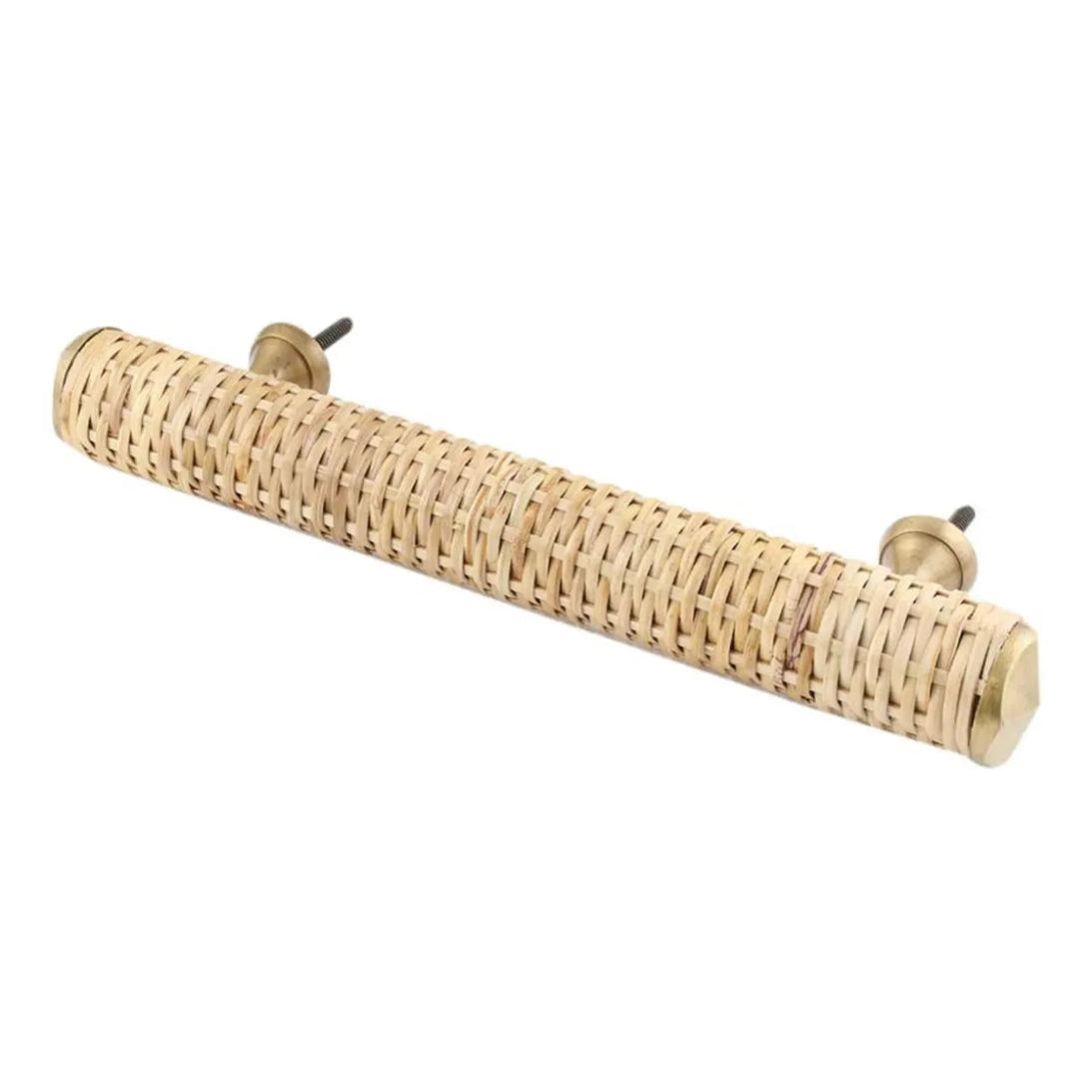 Long Dunstanburgh woven rattan bar handle with antique brass-finish mounting hardware on white