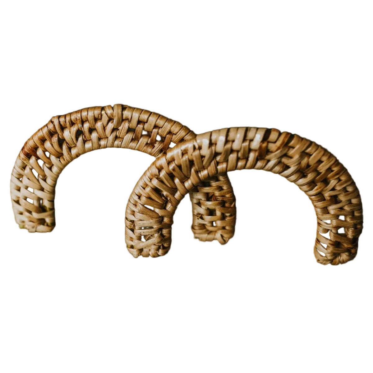 Two Druridge half moon handles with woven rattan detailing on a white background