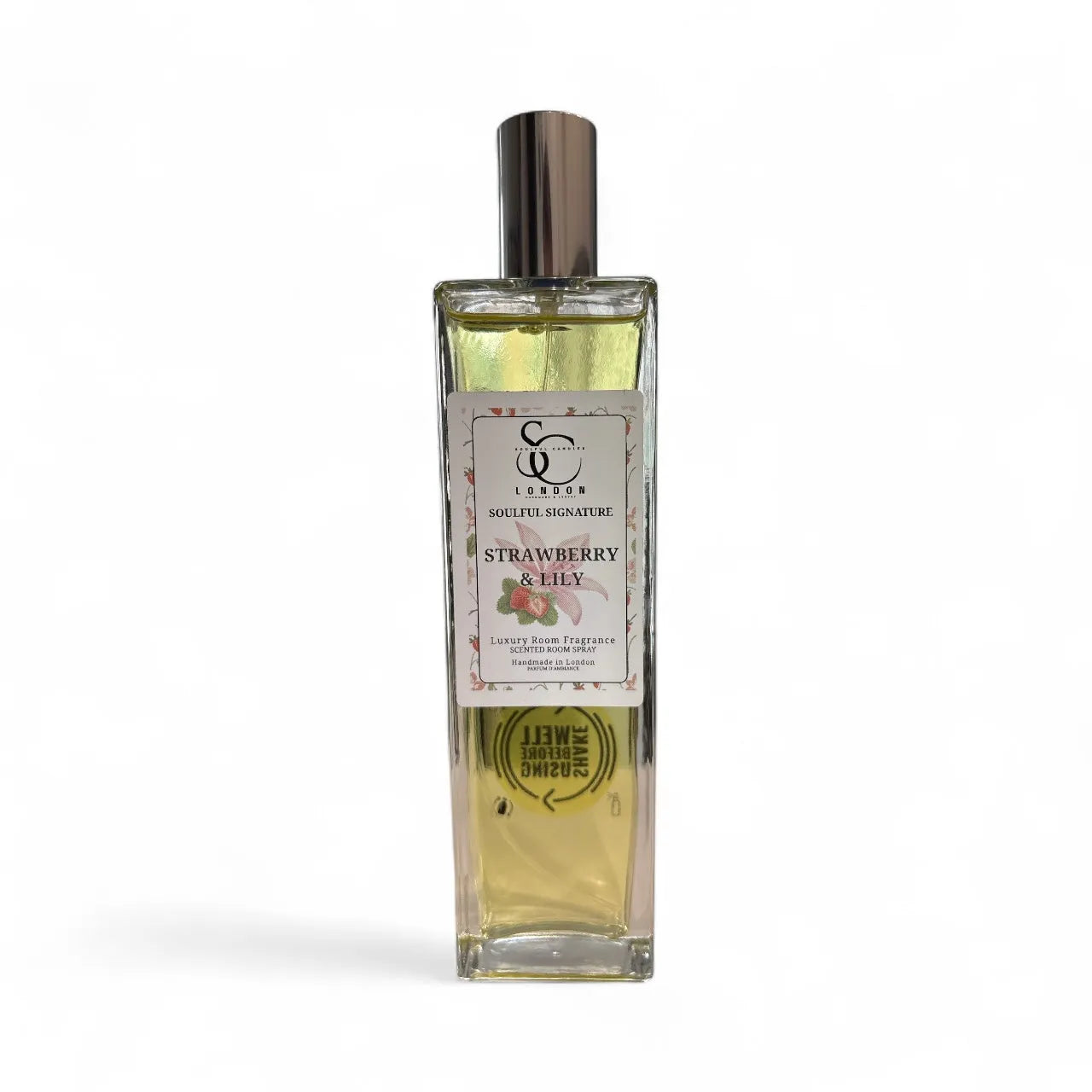Room spray bottle labelled 'Strawberry & Lily' on a white background