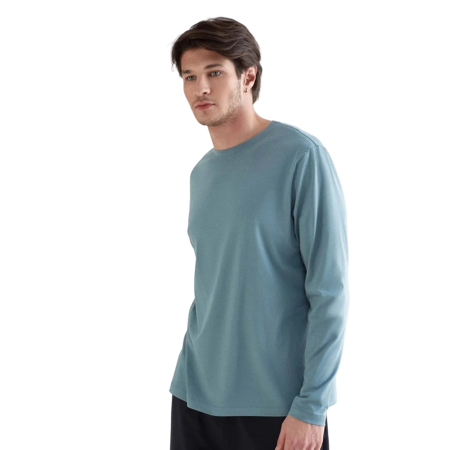 Man wearing a light blue long-sleeve shirt on a white background