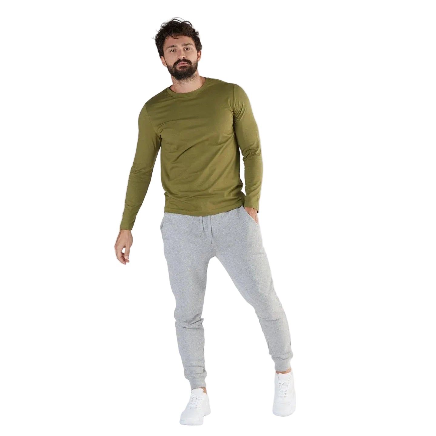 Man wearing a green long-sleeve shirt and gray jogger pants on a white background