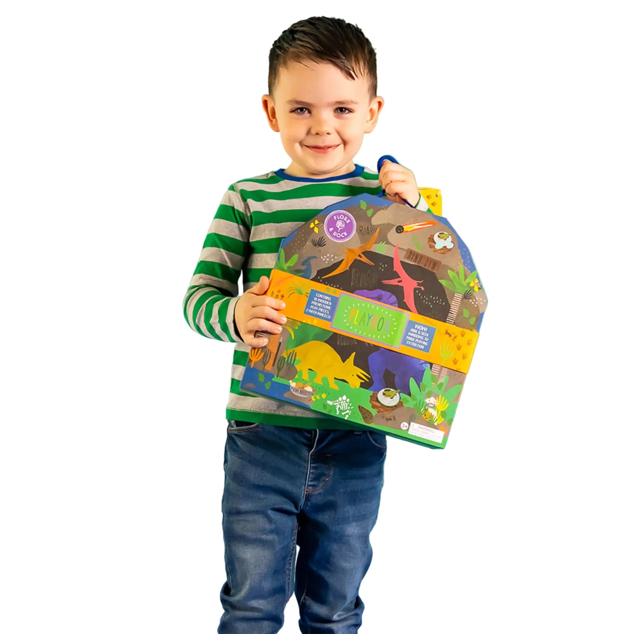 Child holding a colourful dinosaur-themed playset with animal illustrations on a white background
