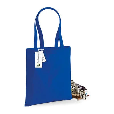 Blue organic cotton tote bag with a tag on a white background