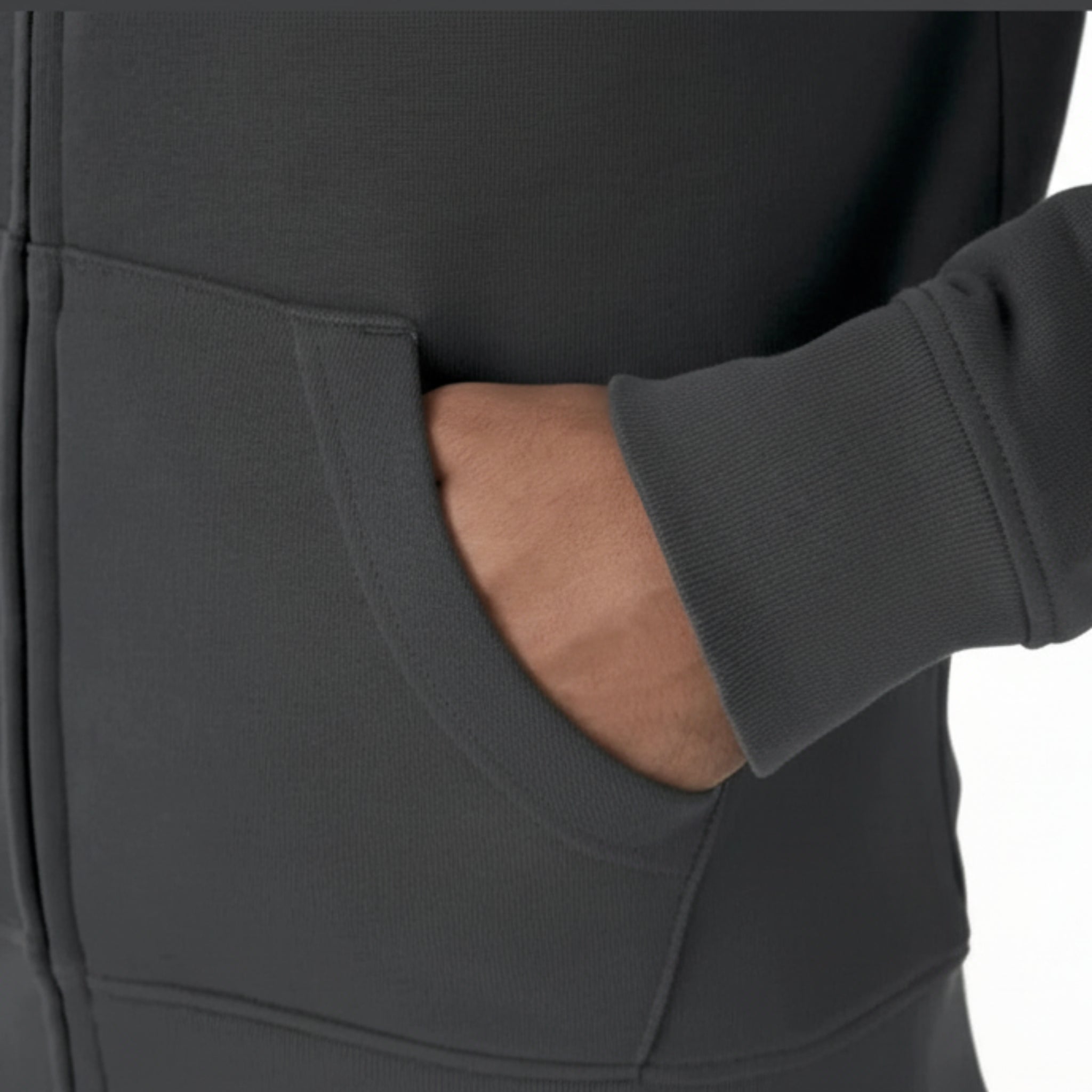Person wearing a dark gray hoodie with a pocket detail on a white background