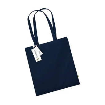 Navy blue organic cotton tote bag with a tag on a white background