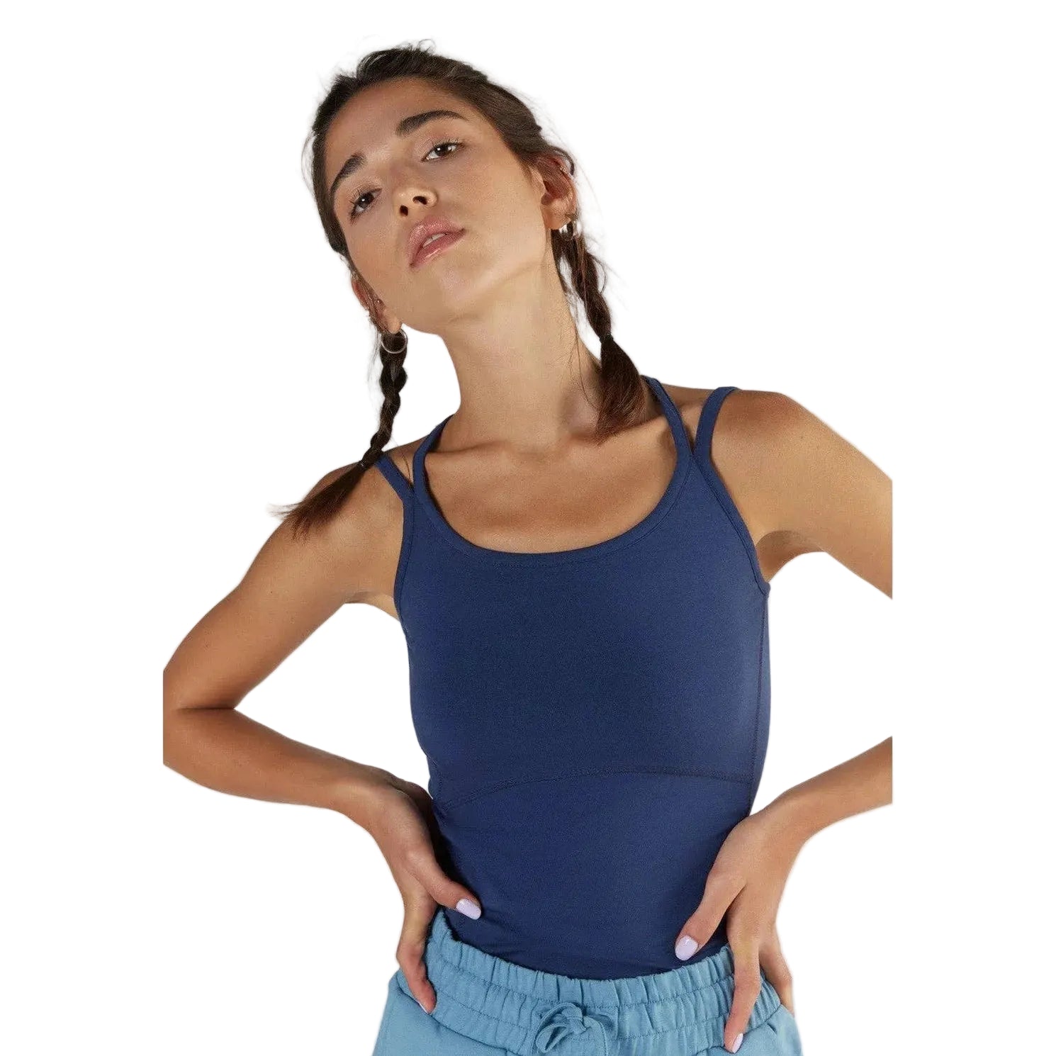 Woman wearing a blue tank top against a white background