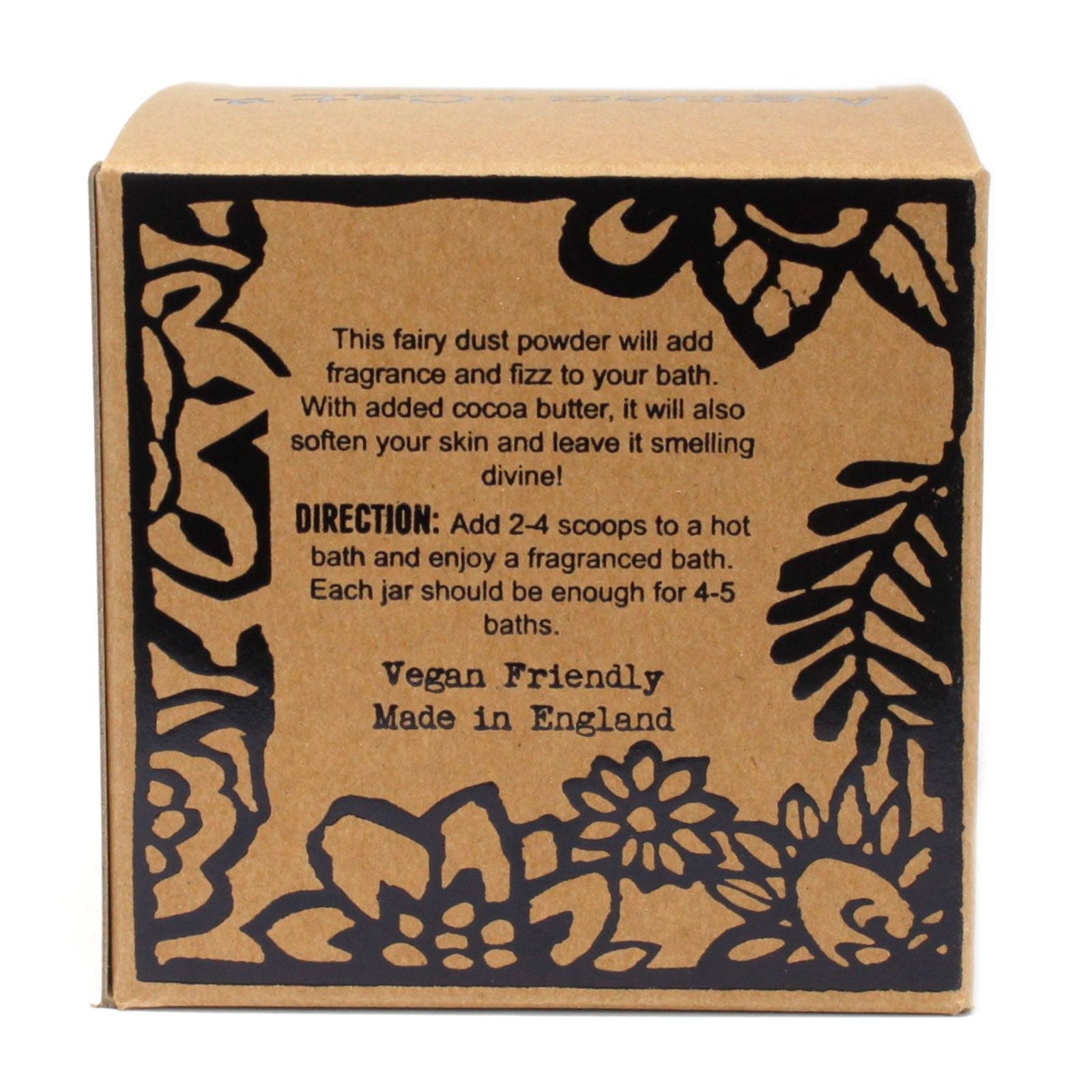 Box of fairy dust bath salts with decorative text and floral designs on a white background