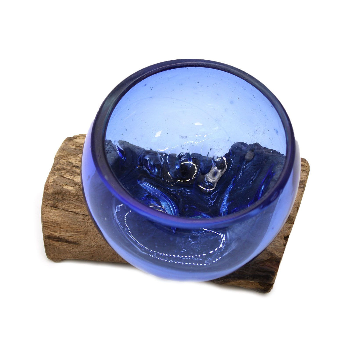Close-up of a blue glass bowl and its irregular glass-and-wood contours