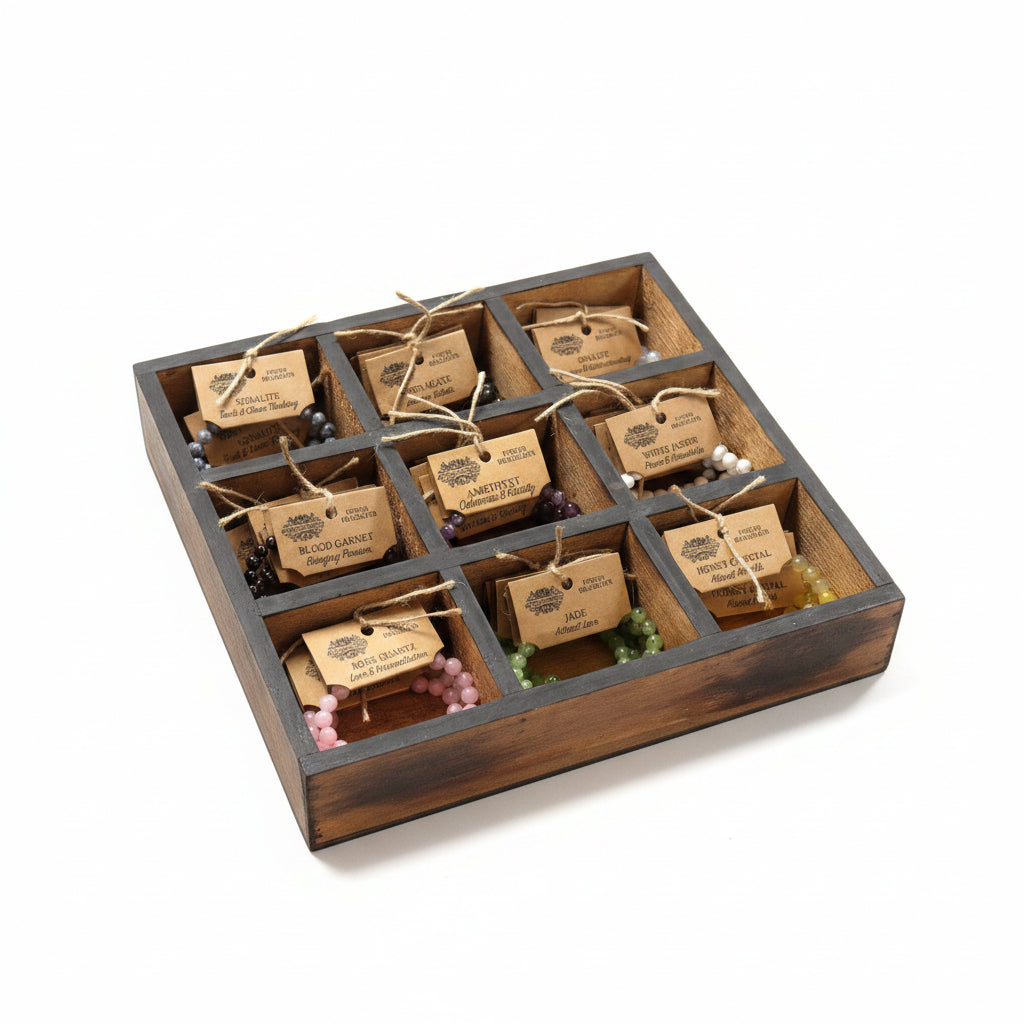 Wooden grid display of various beaded bracelets with tags on a wooden surface.