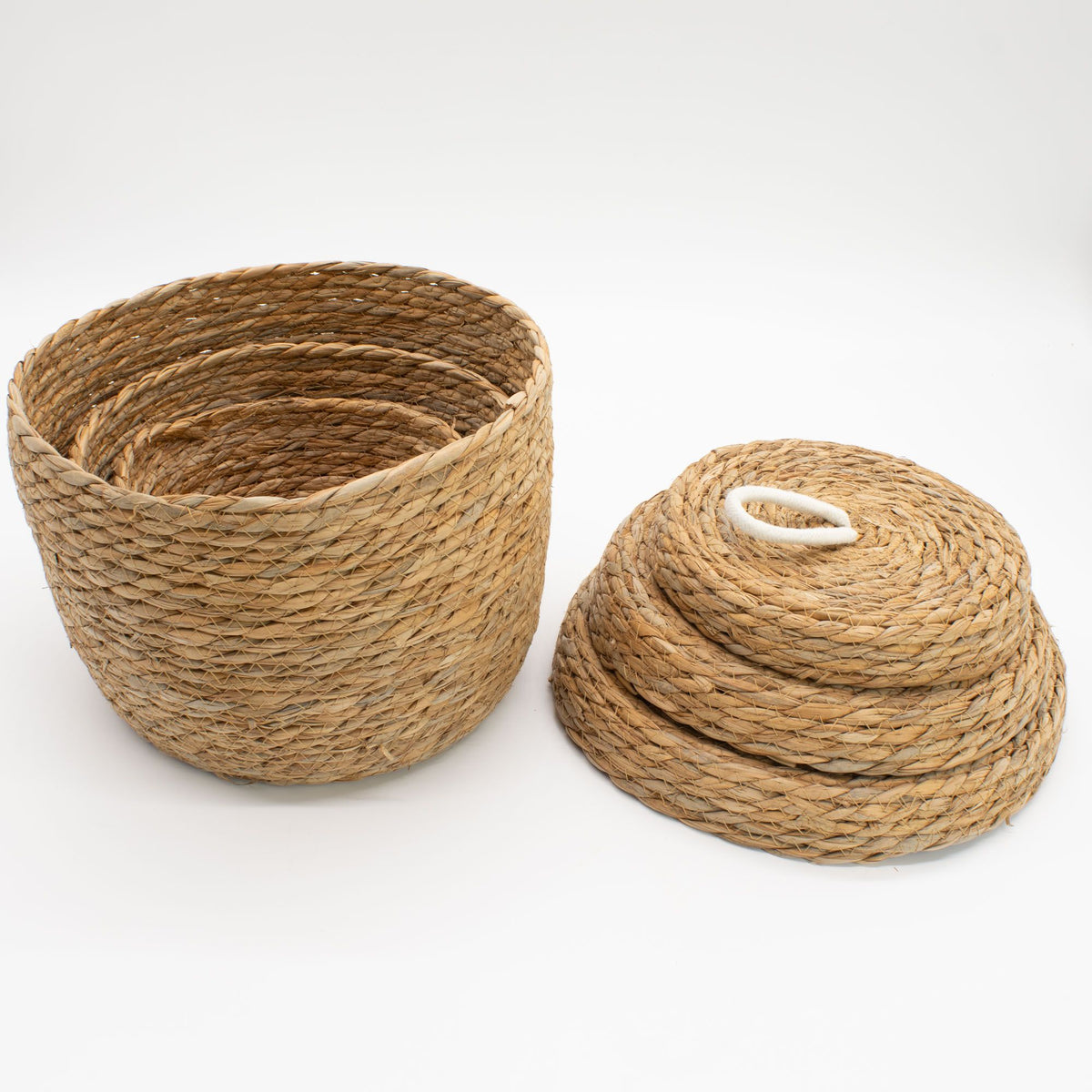 Open woven basket with its lid placed upside down beside it
