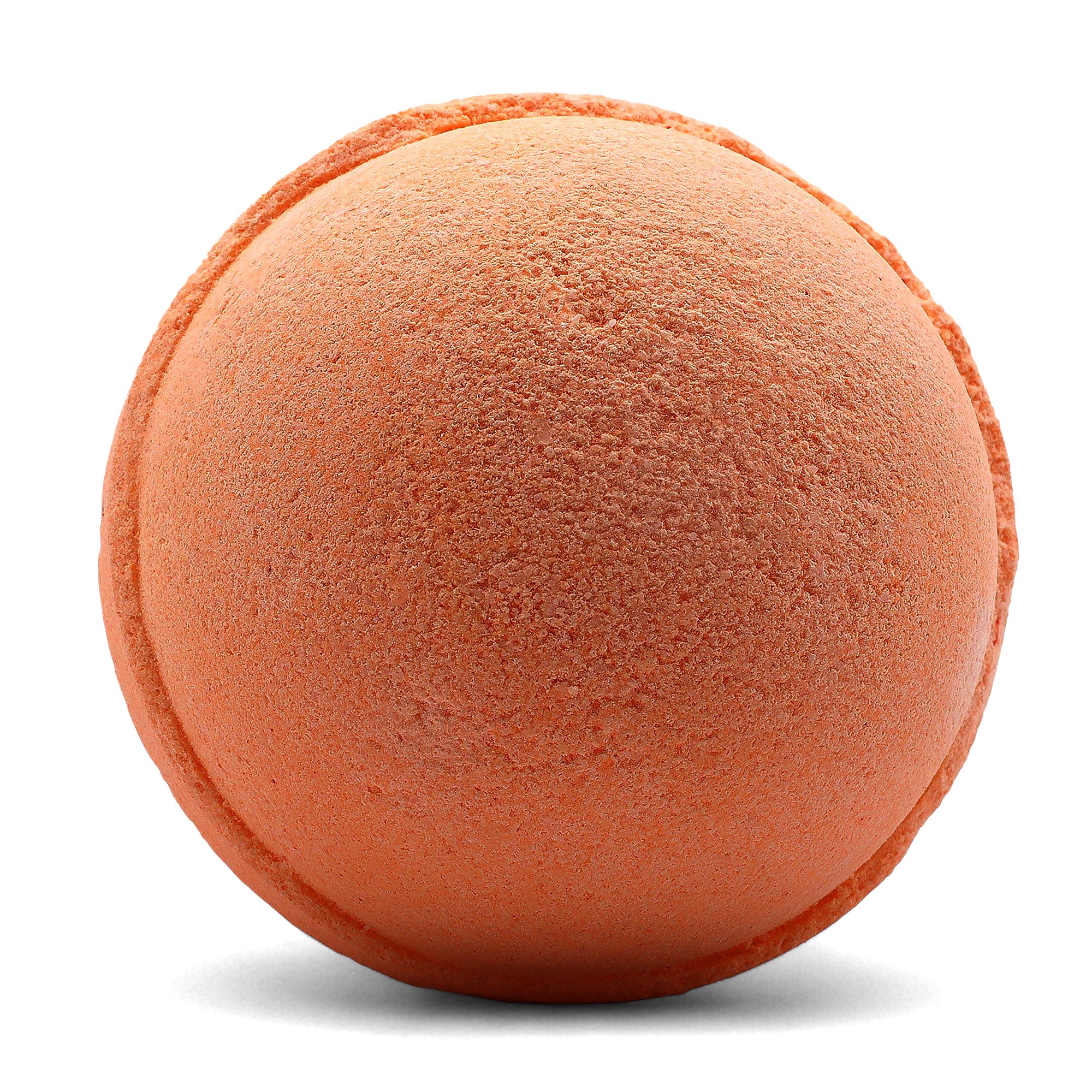 Orange bath bomb on a white background