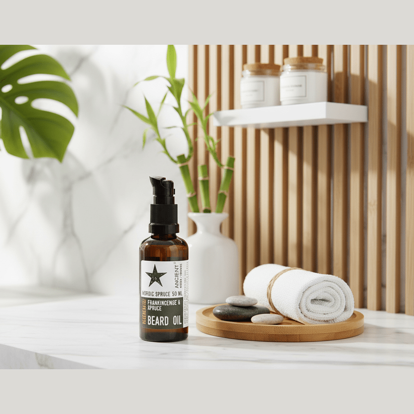 Beard oil bottle on a bathroom counter with plants and towels in the background