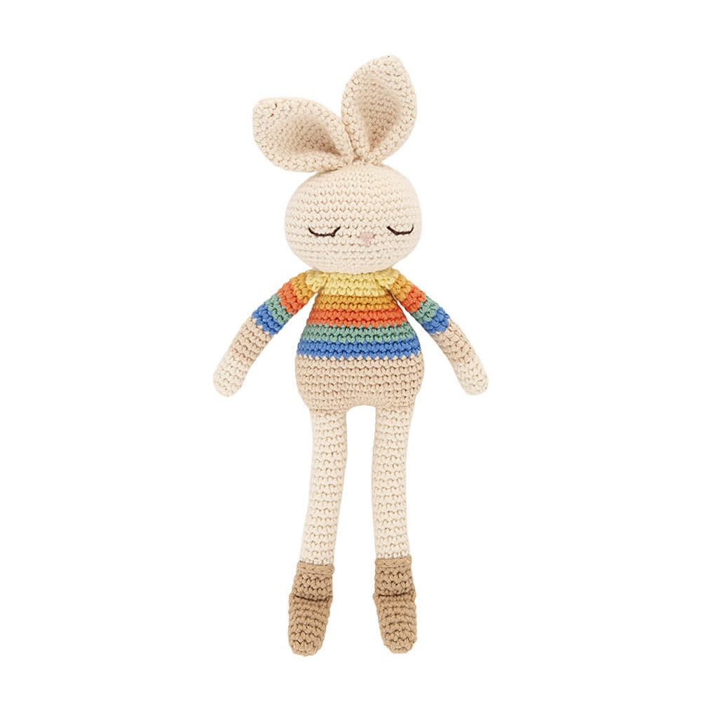 Bonnie Bunny crochet toy with cream body, rainbow stripe jumper and embroidered sleepy eyes