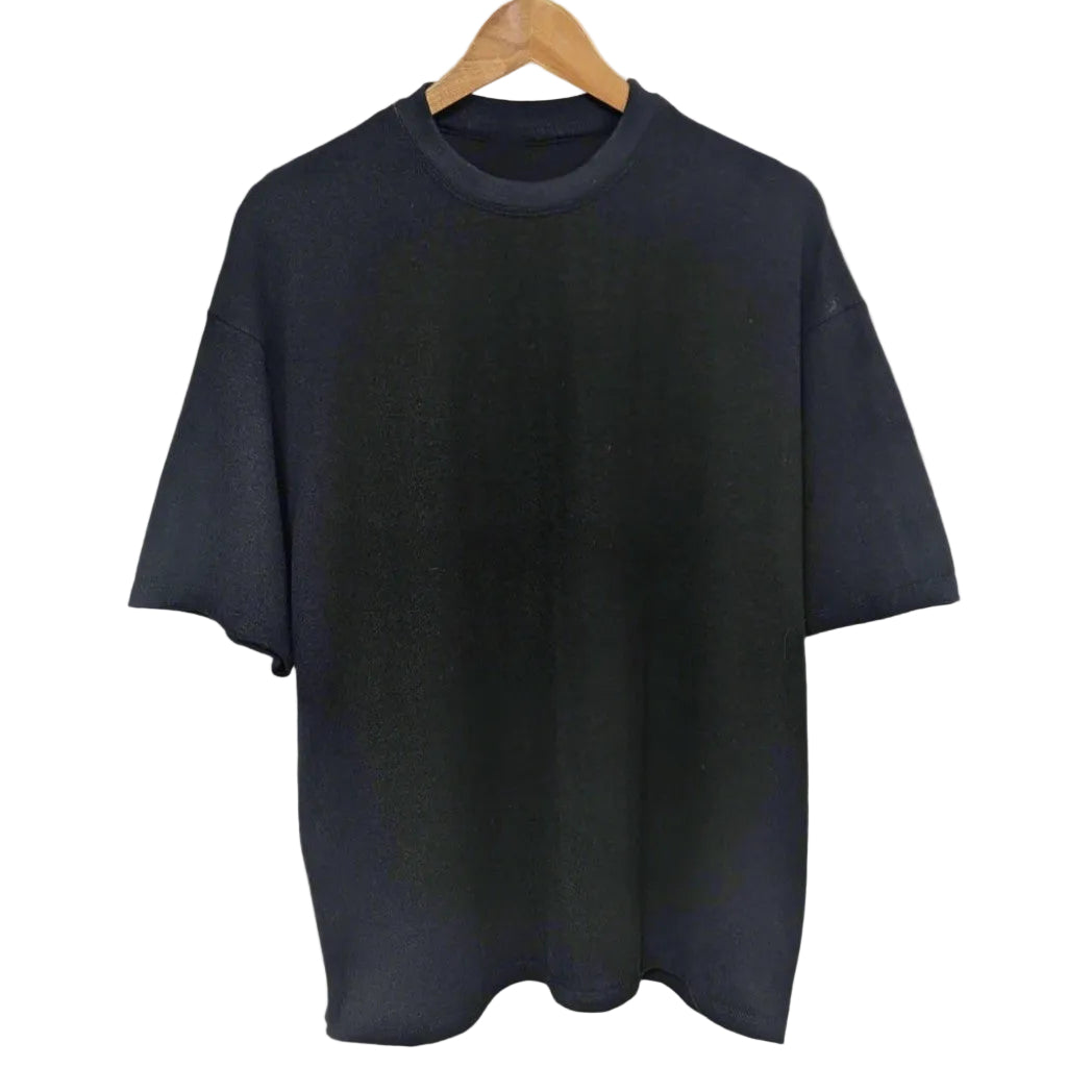 Black eco-friendly t-shirt on a wooden hanger against a plain background